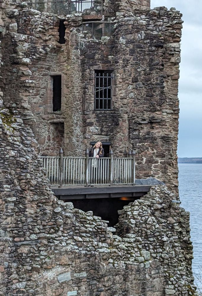 Urquhart Castle is a historic ruined fortress located on the banks of Loch Ness in Scotland, featuring remnants of its medieval structures, including a tower house, great hall, and curtain walls, all set against the dramatic backdrop of the loch and surrounding Highlands, offering a picturesque and evocative glimpse into Scotland's turbulent past.