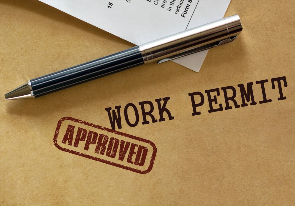 Work permit on a brown envelope