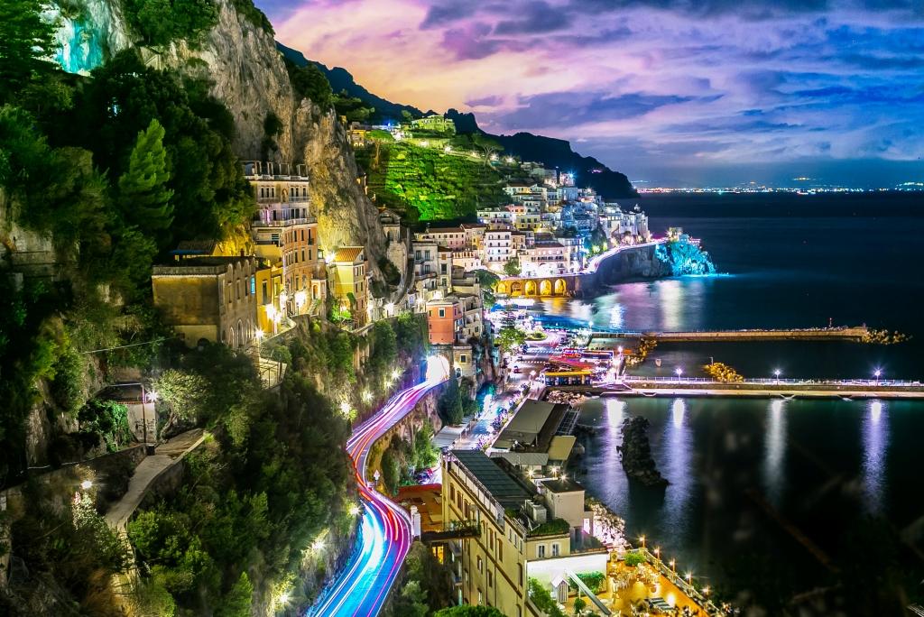 the Amalfi coast as the sunsets on the hills and waters