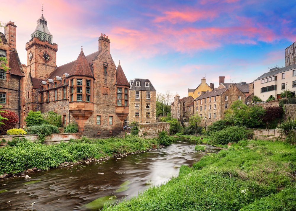Dean Village beautiful old buildings stand proud above the river in the morning light