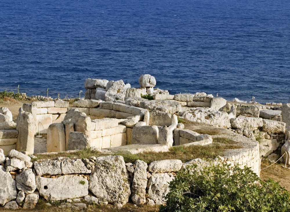 A view of the Mnajdra temple from above where it sits along the coastline