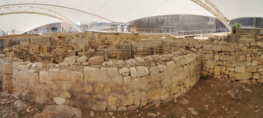A protective shelter now covers the site to prevent further erosion.