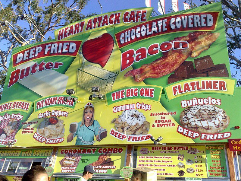A fair booth selling deep fried butter balls