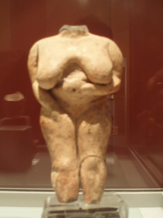 Prehistoric figure of a woman from Malta in the Valetta museum the figurine has no head