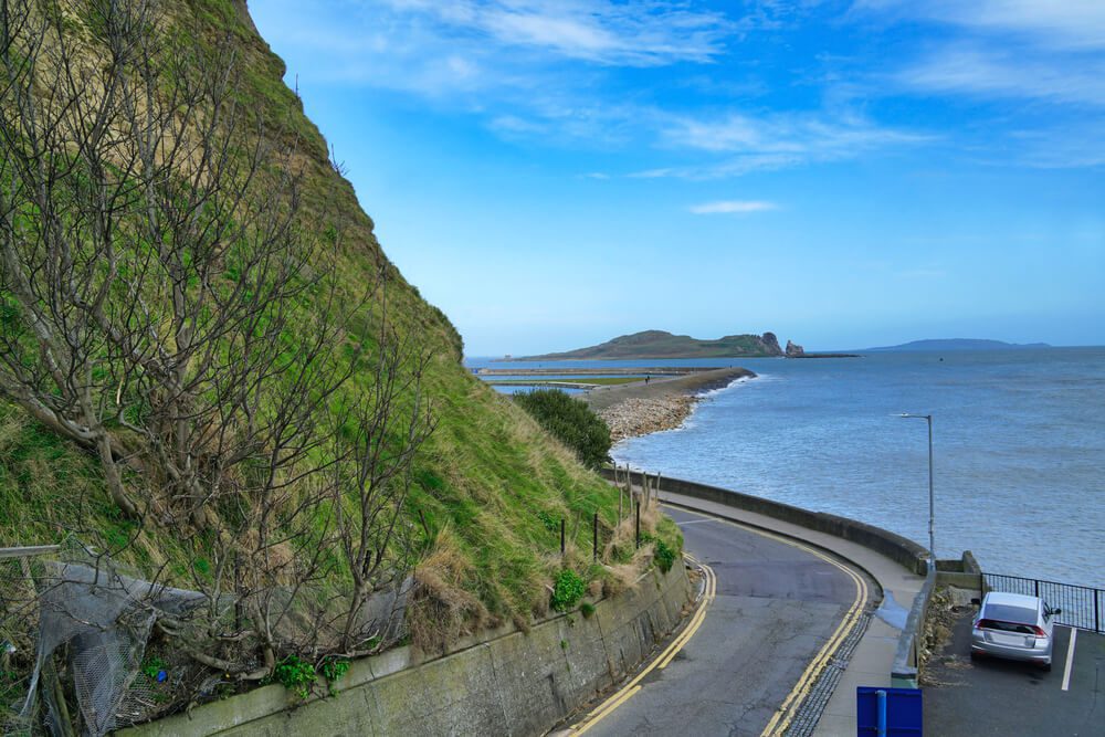 Road leading down from the Howth Head cliffs to the harbor