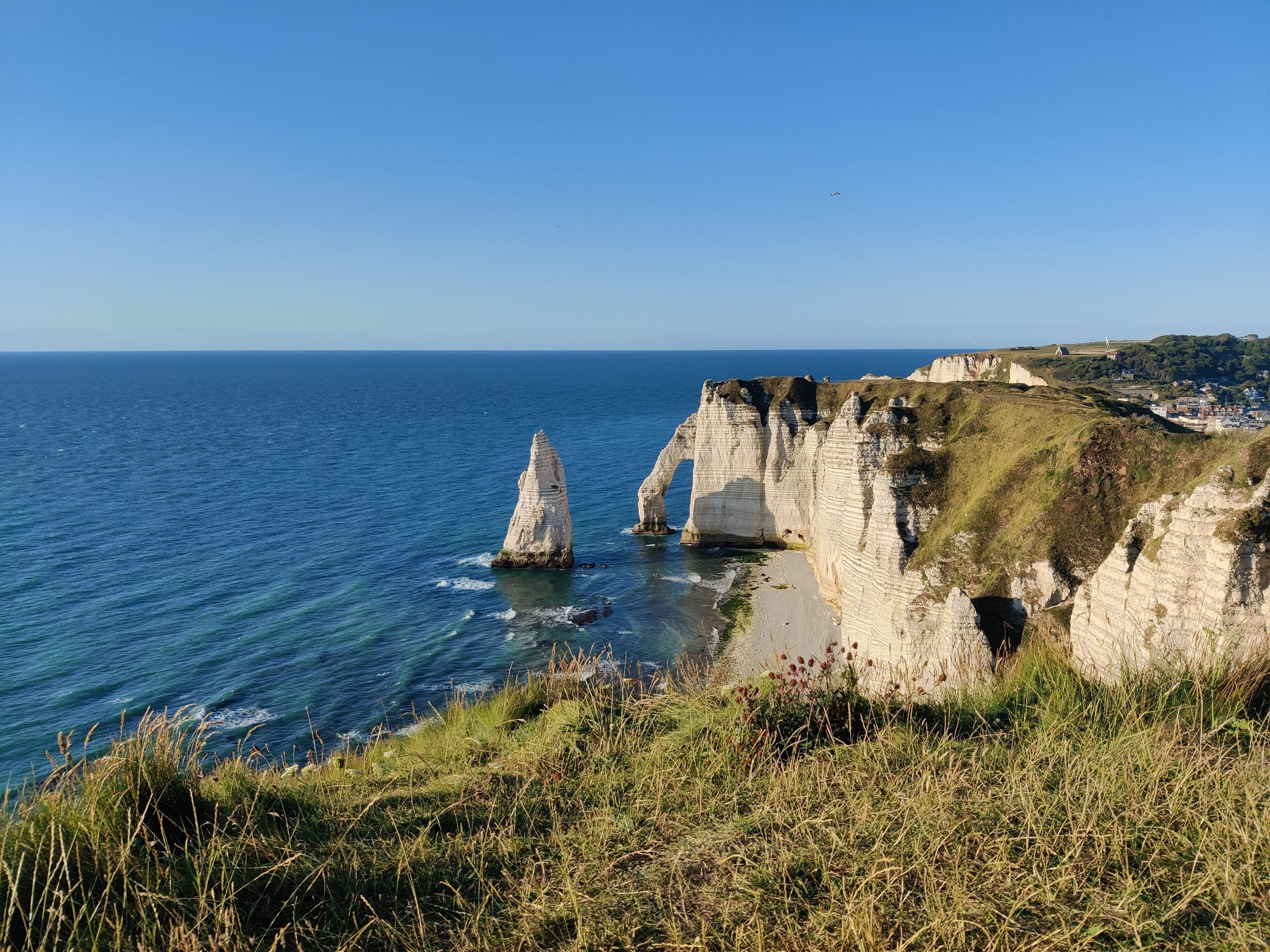 White cliffs of Etretat in France facing the Channel of deep blue