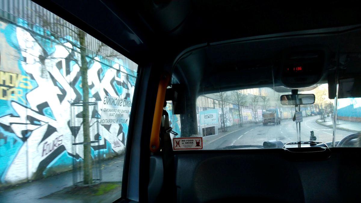 peace walls through taxi windows