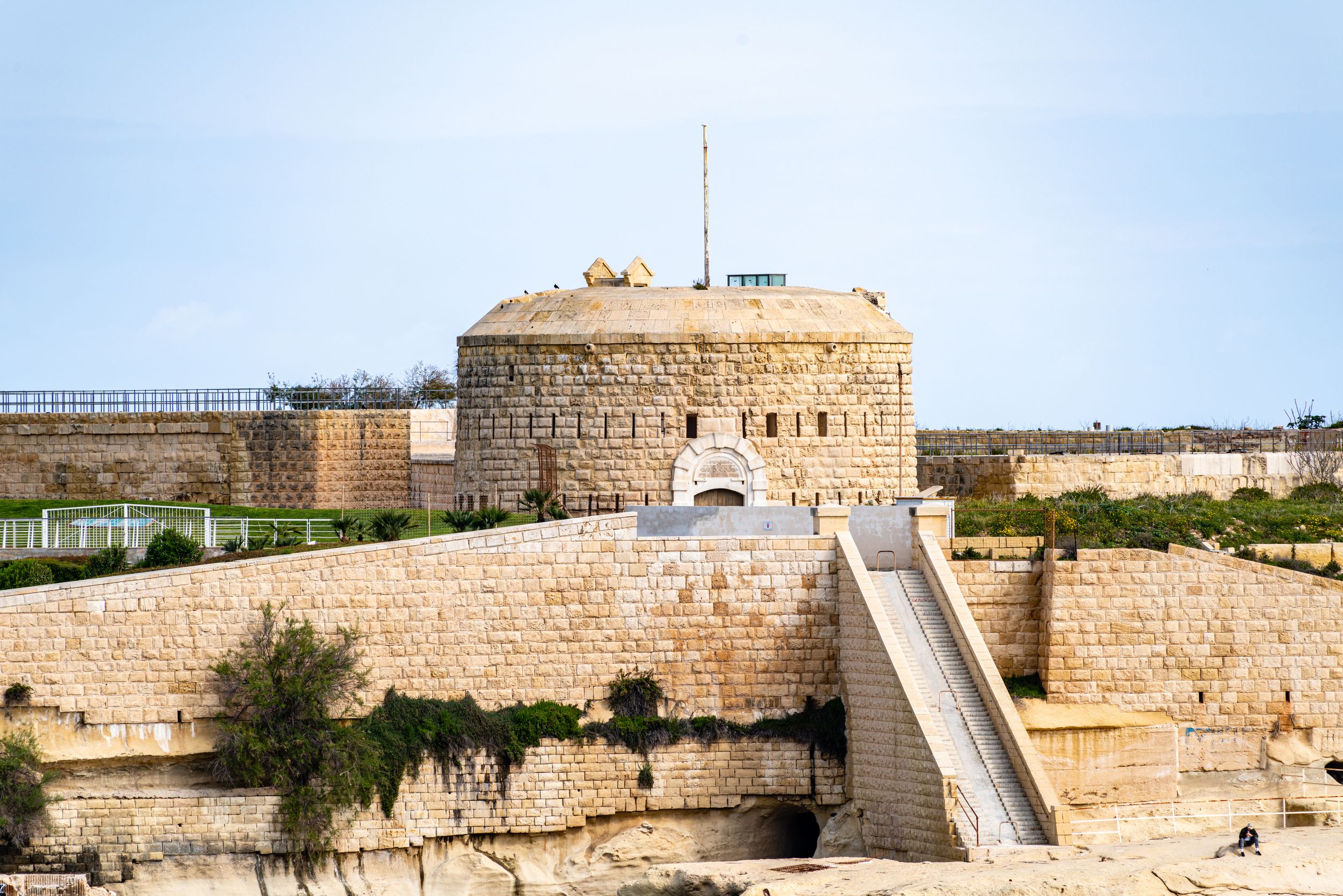 Explore the ancient stone fortifications of Valletta, Malta, showcasing its rich history and architecture.