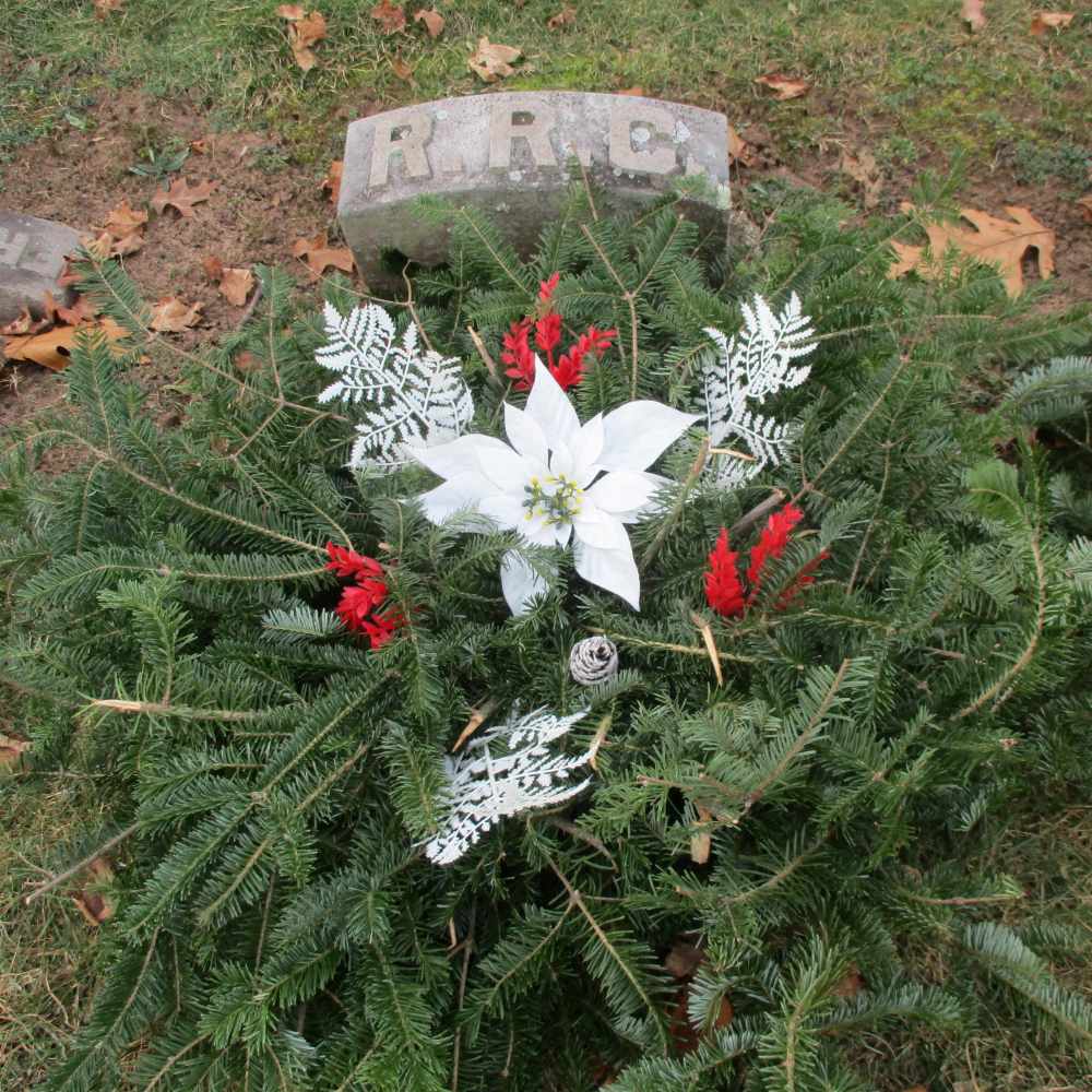 Wreath on a gravestone at Christmas