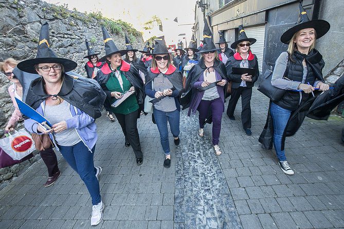 A ghost tour of Kilkenny with folks dressed up with witch hats