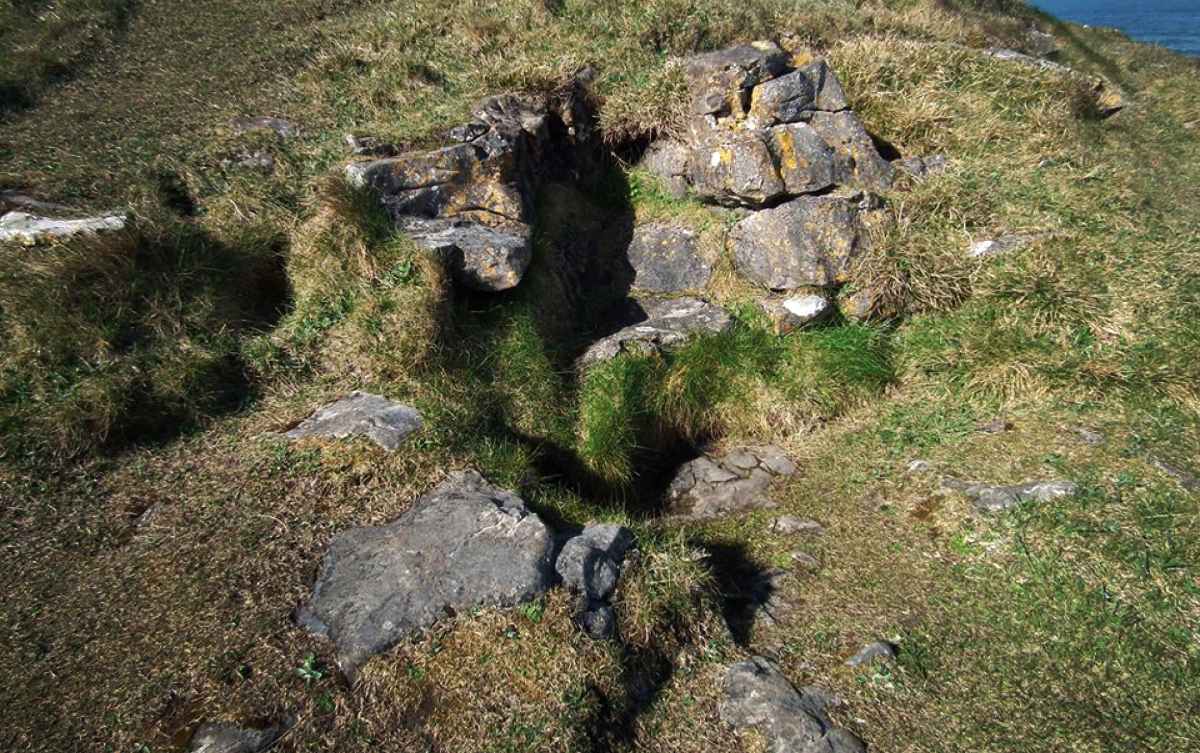The magical wishing chair at Tullan Strand. A unique pile of rocks in the shape of a chair