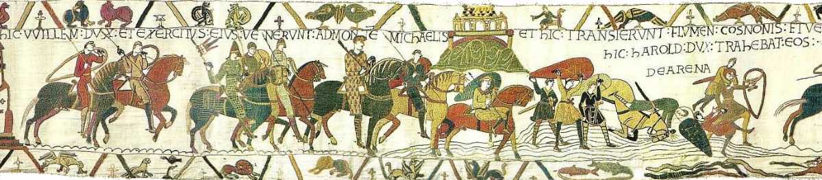 A section of a medieval tapestry depicts armored figures on horseback and on foot crossing a river with Latin text above.