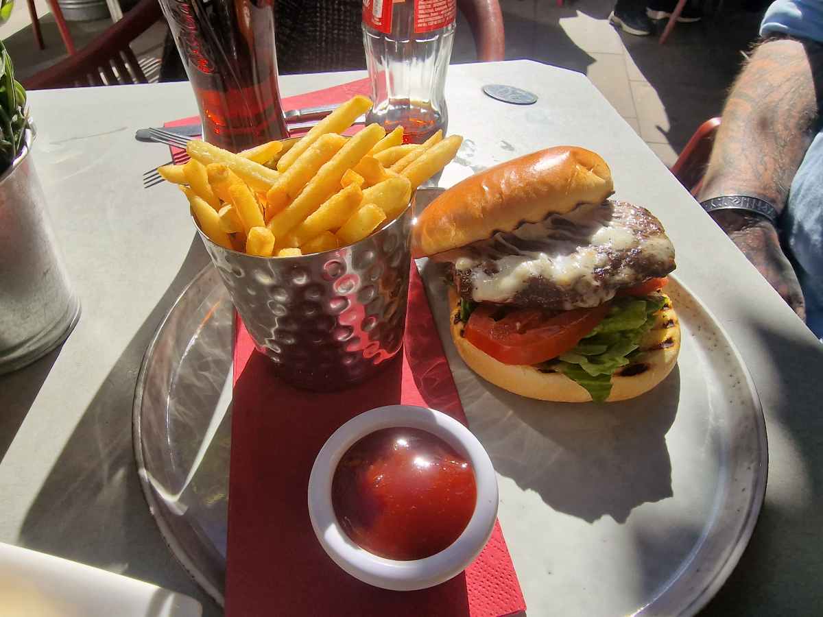 Burger with homemade ketchup and chips Paris