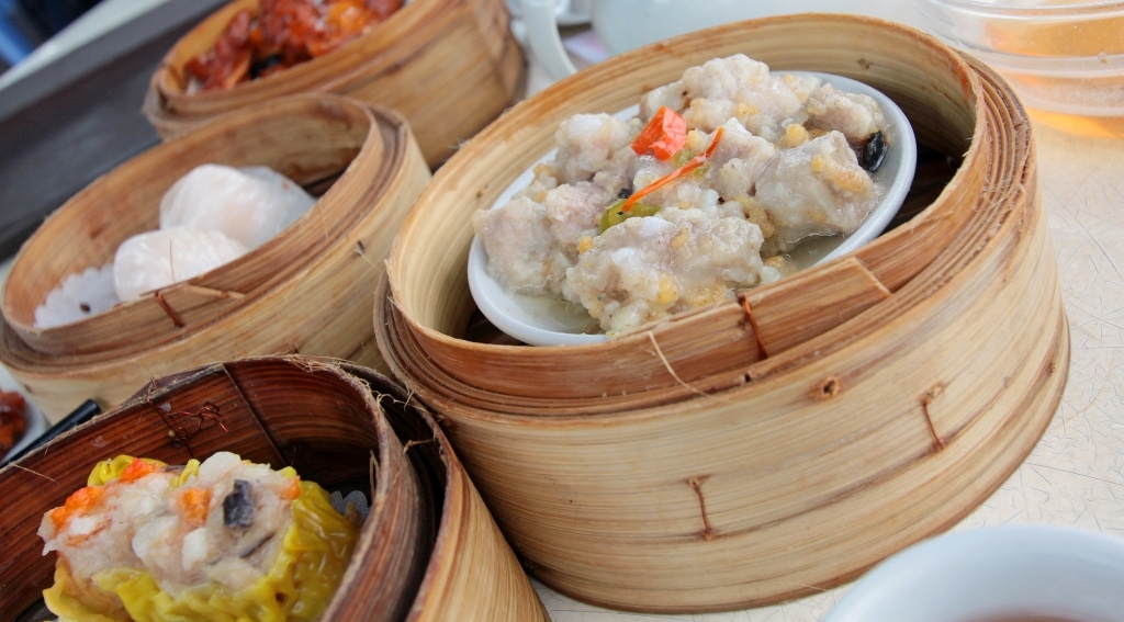 bamboo steaming baskets filled with dim sum in all its varieties